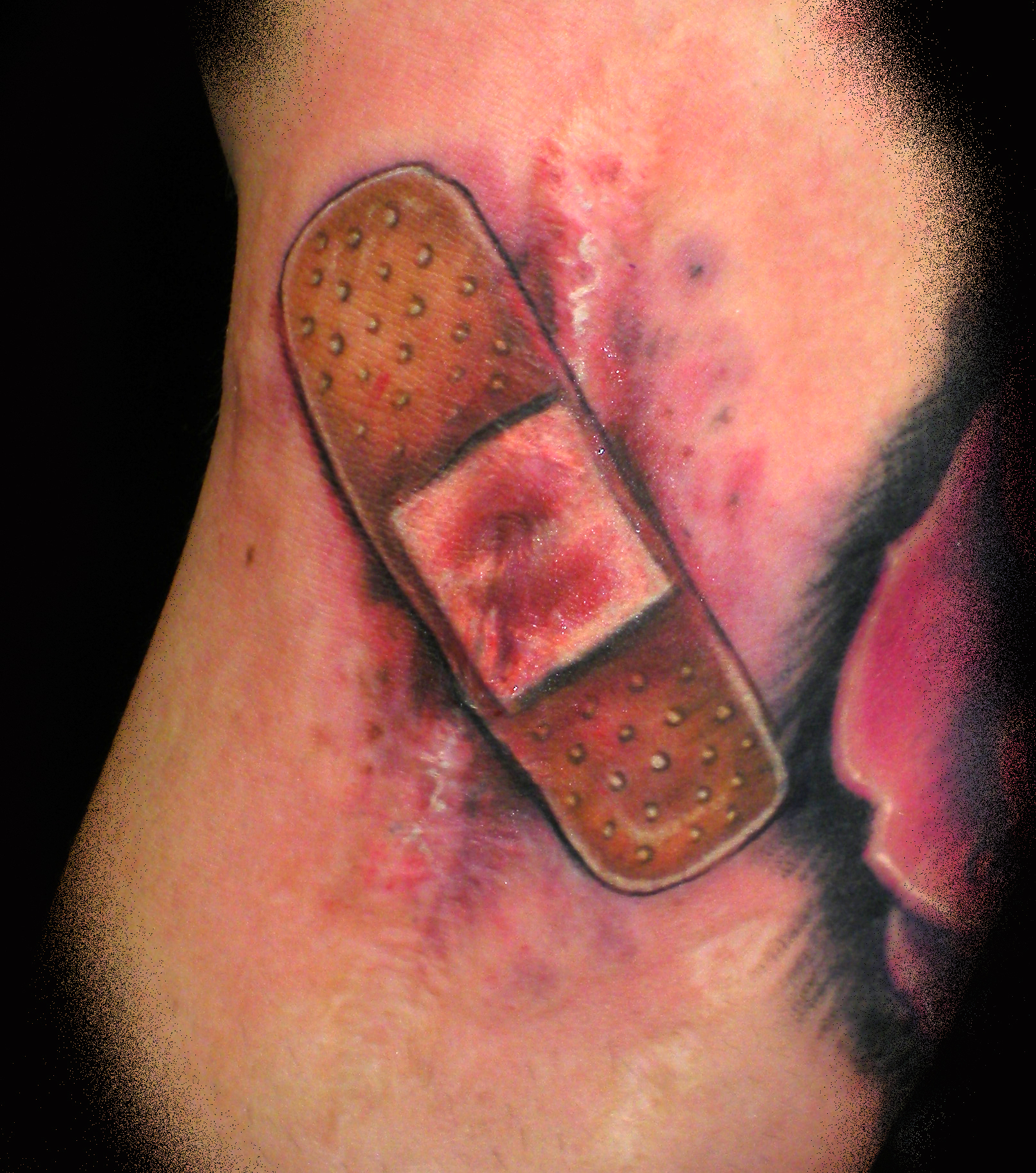 Tattoo uploaded by Tattoos By Topher • Child's Play band aid. • Tattoodo